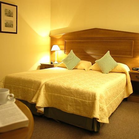 Astons Apartments Londres Quarto foto